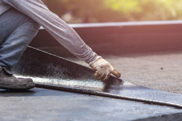 Professional Waterproofing technician working in Fremont, MI